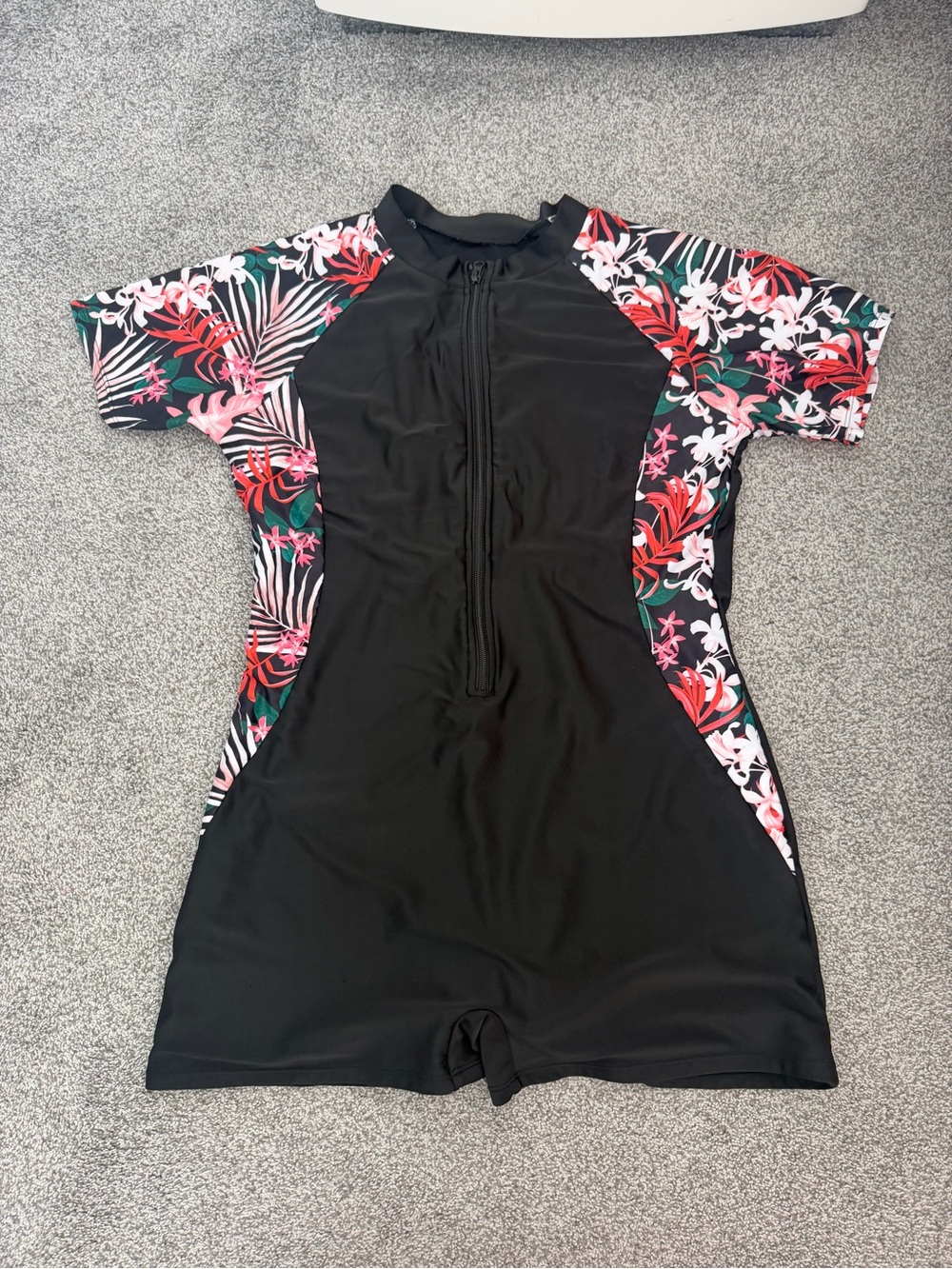 One piece swimsuit.